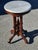 Add a touch of historic Americana to your home with this stunning antique American Victorian parlor table. Featuring a...