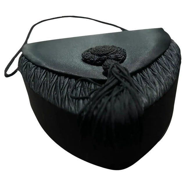 Van Cleef & Arpels 1990s Vintage Black Silk Handbag This exquisite and rare vintage handbag by Van Cleef & Arpels is a...