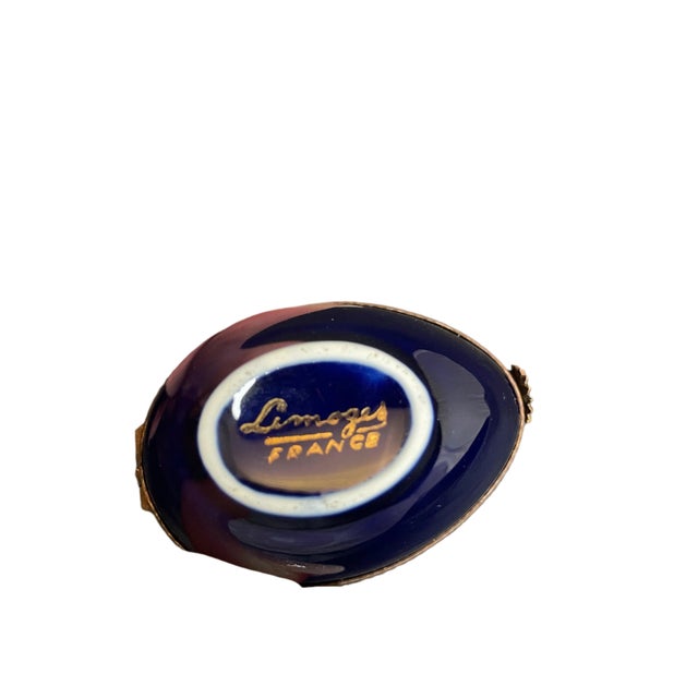 2.6" wide 2.2" tall Unlock the potential of your treasures with the stunning blue Limoges Bee Lockbox. This intricately...
