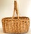 This is a large hand made rattan basket from the late 1990s. It is probably Asian in origin. It is 21" in diameter and...