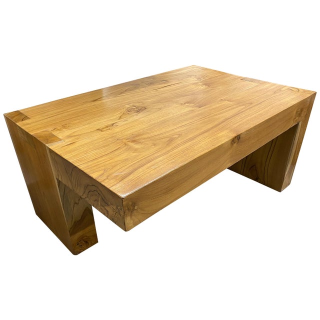 The teak balance coffee table is made from reclaimed teak wood with a four inch top section. Designed with a perfect...