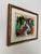 This vibrant expressionist abstract painting features bold, gestural brushstrokes and a dynamic palette of reds,...
