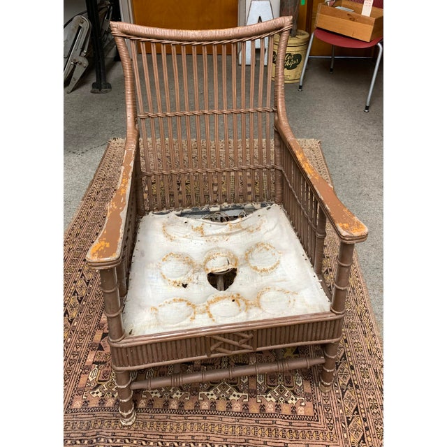 Fabulous antique split reed chair combining wood for the armrests, front legs and crossbar. Faux bamboo or spool turning...