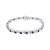 Vivid created birthstones and sparkling white diamonds are set in this S-link tennis bracelet crafted in cool .925...