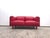Original poltrona frau twice two-seater sofa in a sophisticated, vibrant red. a true design statement – ​​designed by...