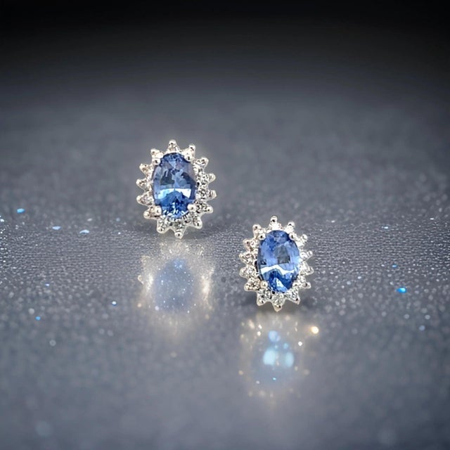 Natural Finely Faceted Quality blue Sapphire and Diamond halo Earrings set in 14k White Gold with a total of 1.68 TCW...