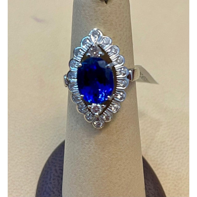 3.65 Carat Oval Tanzanite and 1 Carat Diamond Ring 18 Karat White Gold, Estate For Sale - Image 14 of 18