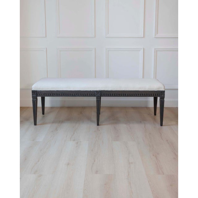 A Swedish bench dating to the 19th century. The proportions and construction reflect the standards of the period. A...