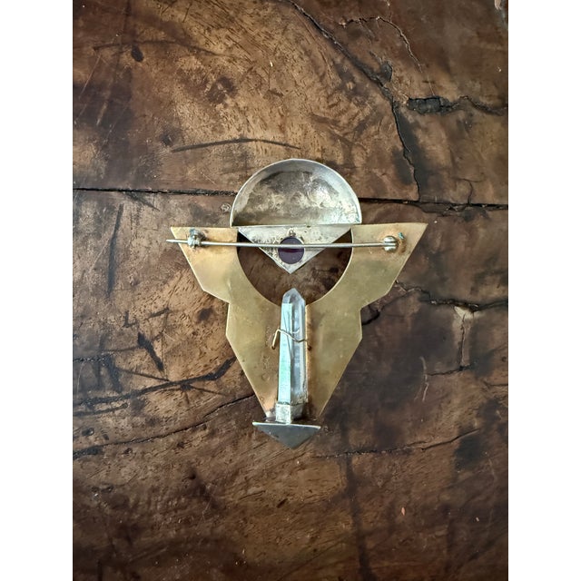 A striking signed studio brooch by artist Hope Konecny, executed in a bold modernist composition of geometric form and...