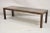 Vintage Mid Century Modern Brown Tortoiseshell Lacquer Parsons Style Bench / Coffee Table. Circa Mid to Late 20th Century....