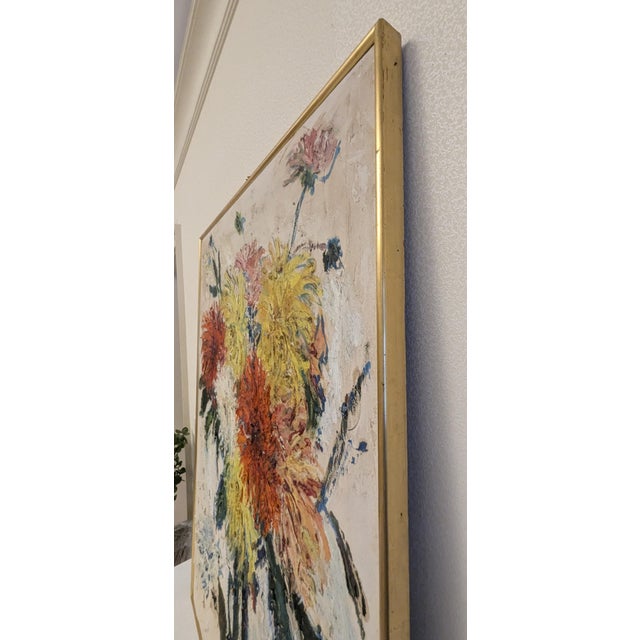 This spectacularly, vibrant bouquet of dahlias, seems to be bursting out of the canvas with the artist using the "impasto"...