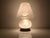 Murano glass mushroom swirl lamp with a gold base. Made in Murano in the 1970s, this mushroom-shaped lamp will bring a...