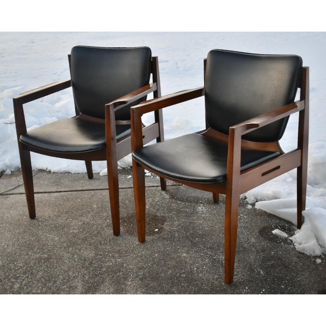 Vintage (1950's) Pair of Arm Chairs have an MCM Style. Made by Thonet. The Frames are Wood. Wood - Pecan. The...