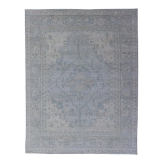 Modern Designed Rug With a Light Blue Background and Tribal Medallion Motifs For Sale