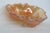 This wonderful Bowl is made of carnival glass. This dish presents a lovely "Leaf and Loganberry" pattern; It features a...