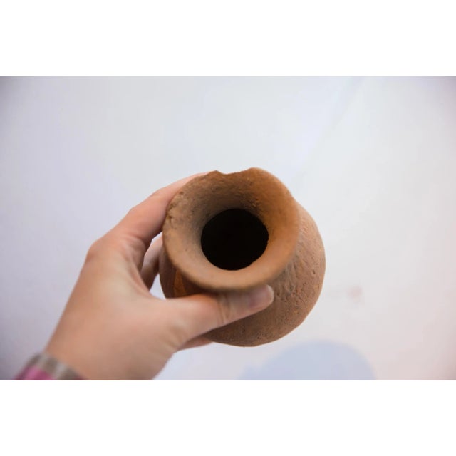 :: Antique handmade African terracotta vase. Circa the 19th century or possibly older, this piece has such incredible...