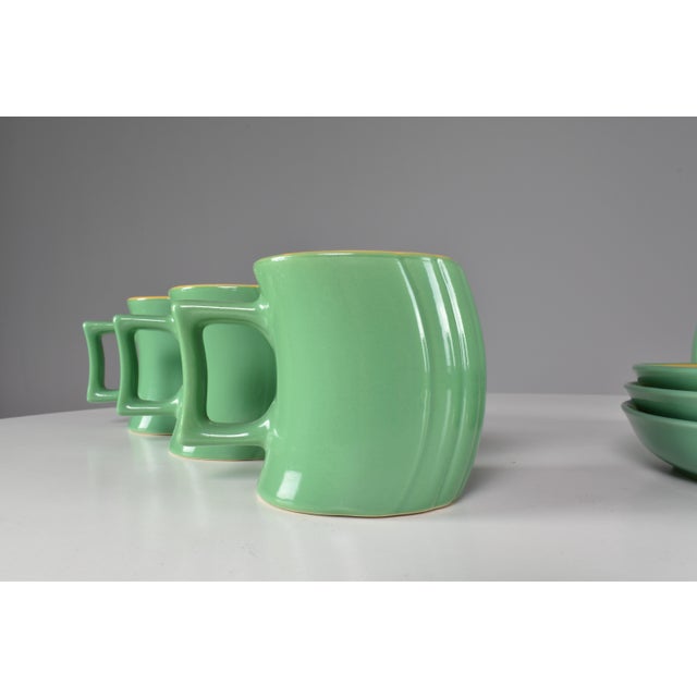 Elegantly crafted with avant-garde curves, this ceramic tea service showcases the distinct artistry of Massimo Iosa Ghini,...