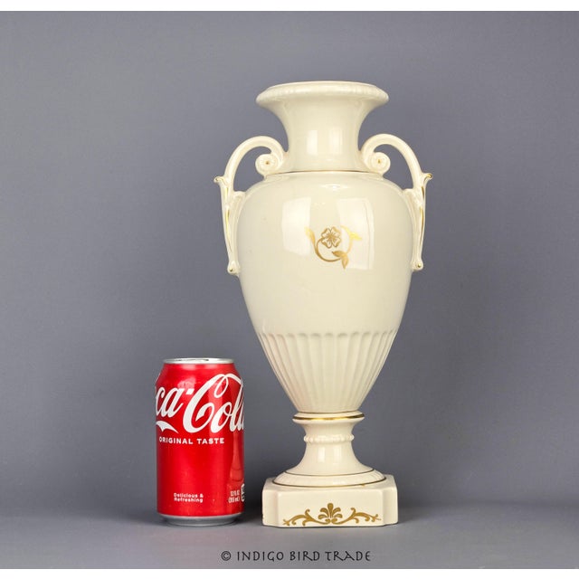 This exquisite 19th-century Old Paris amphora vase embodies the elegance and artistry of its era. Crafted from glazed...