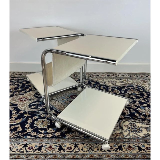 This is a special set of tables! Can be used as side tables, trolleys or bedside tables. The tables consist of a chrome...