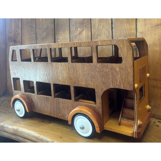 A delightful vintage wooden double-decker bus, full of charm and character. Crafted with lovely attention to detail, this...