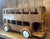 A delightful vintage wooden double-decker bus, full of charm and character. Crafted with lovely attention to detail, this...
