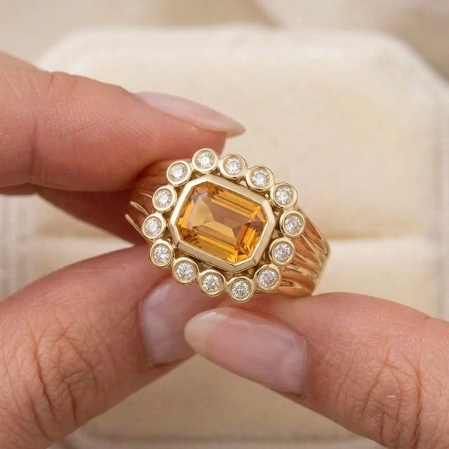 Make a bold, sophisticated statement with this exquisite vintage-inspired cocktail ring. At its heart sits a striking...