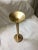 This solid brass candlestick stands 15 inches tall and 5 inches in diameter at the pace it has that lovely warm, gold...