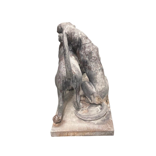 Capture the heartwarming essence of loyalty and lifelong companionship with this magnificent vintage cast iron garden...