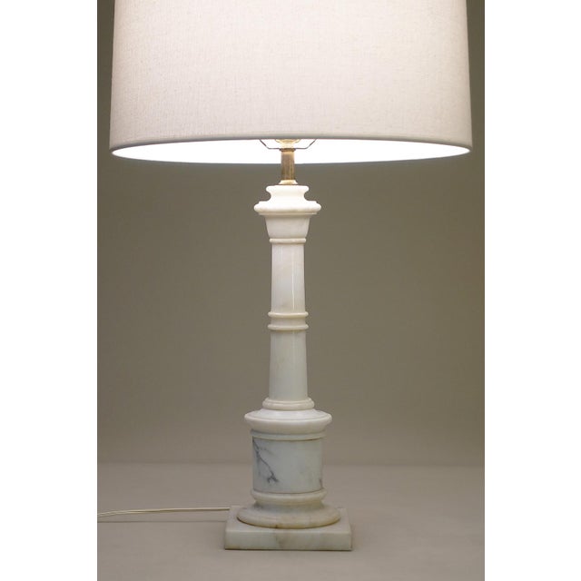 A striking Italian Carrara marble Classic Hollywood Regency "Tuscan" style Column table lamp from Italy circa 1960's....