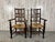 Georgian antique harlequin spindle back dining chairs with woven rush seats. Classic old English design where each chair...