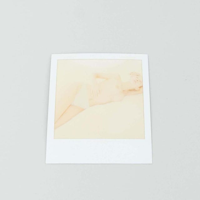 Set of polaroid photographs by miquel arnal. In original condition, with minor wear consistent with age and use,...