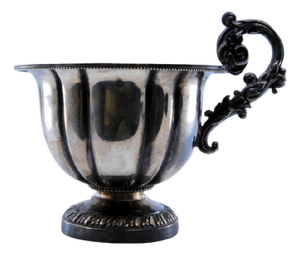 Creamer in Gummed Silver with Embossed Handle and Base with Scrolls