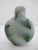 Vintage Beijing glass snuff bottle featuring colorful green striations on a frosted white background. Stopper with intact...