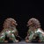 This is a striking pair of vintage cloisonné enamel guardian lions, also known as Foo Dogs or scholar's desk lions. Each...