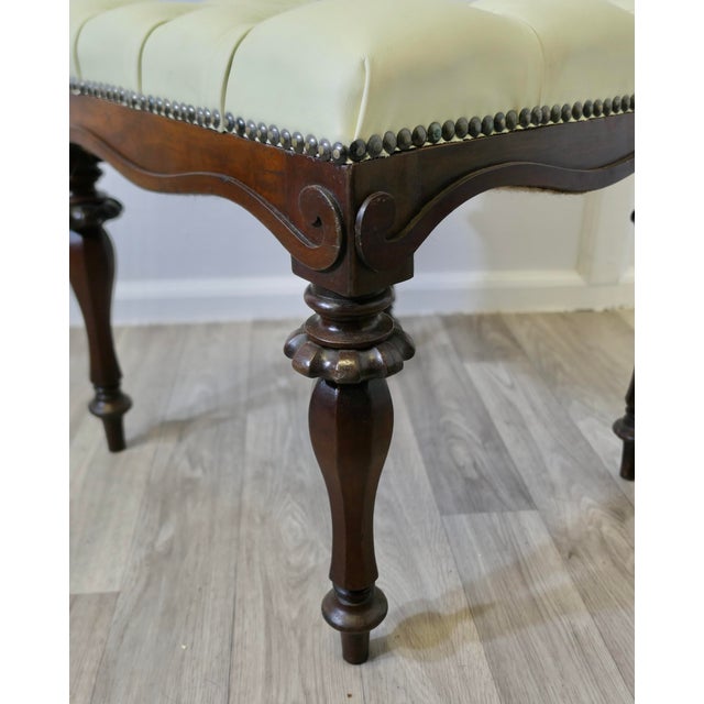 A Pair of Chesterfield Buttoned Leather Walnut Library Window Stools A Lovely pair, these very attractive Victorian stools...