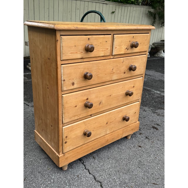 This is a lovely antique pine chest! This piece dates to the 19th century and has lovely patina. The wood has a warm glow,...