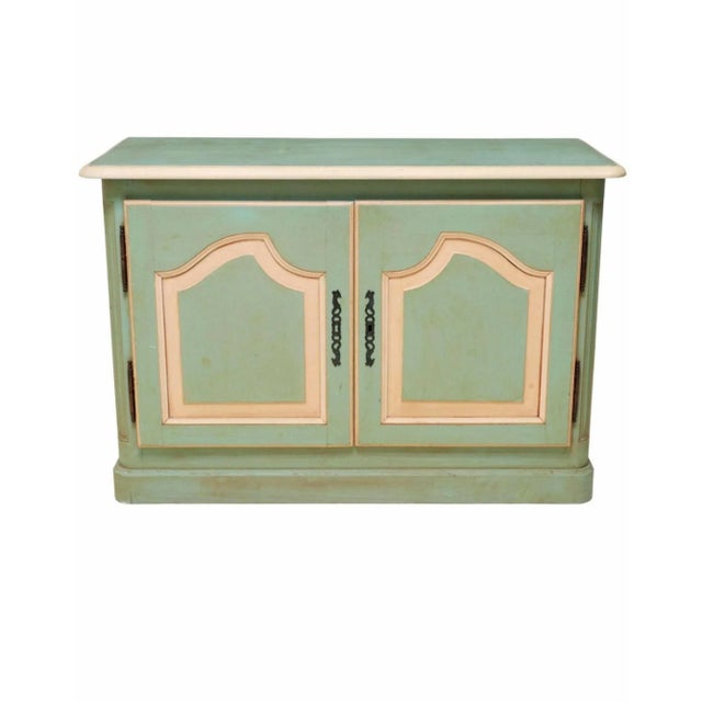 A charming vintage French paint-decorated solid wood enfilade in the style of 18th century Louis XV. Born in France in the...