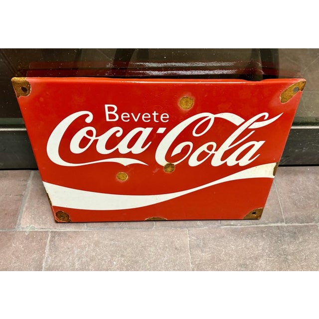 Vintage 1960s Coca Cola enameled iron sign with some rust spots
