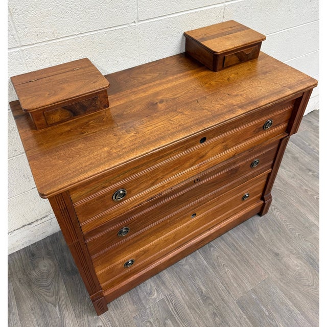 This is a beautiful antique Victorian walnut chest of drawers by Abernethy Furniture Co. of Kansas City, Missouri, dating...