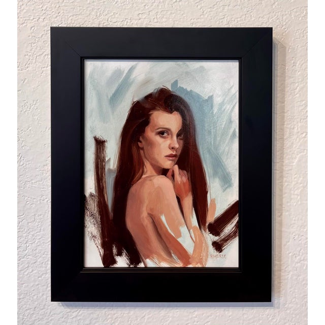 This oil on board painting presents a young woman looking over her shoulder, her expression a blend of contemplation and...