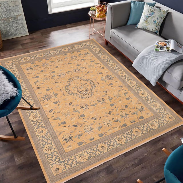 Enhance the ambiance of your home with this magnificent Persian-influenced Turkish hand-knotted rug made by skilled...