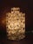 A rare sculptural table lamp designed by Albano Poli for Poliarte in the 1960s. This exceptional piece comprises 17 cubes...
