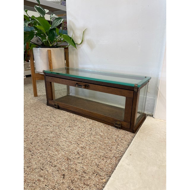 This antique countertop display case was produced by Alfred Noack, a noted early 20th-century maker of "High Grade Show...