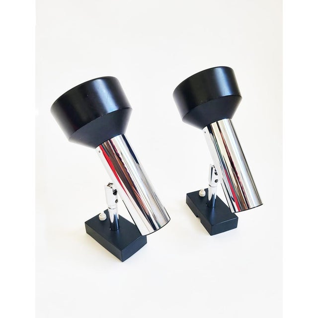 Clean, minimalist set of sophisticated 1970s spot lights from German manufacturer STAFF that can be mounted to the wall....