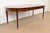 An exceptional Federal, Hepplewhite, or Regency style extension dining table By Henredon USA, Circa 1960s Gorgeous banded...