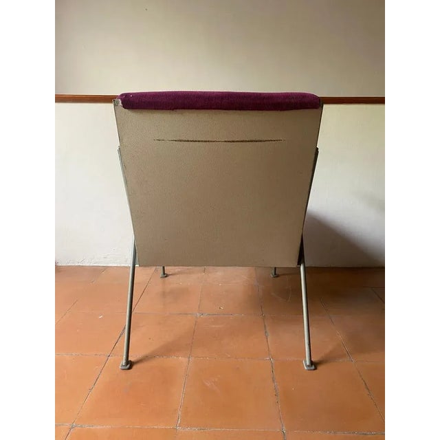 A model "Oase" chair, designed by Wim Rietveld for Ahrend de Cirkel in 1958. The chair is newly upholstered using purple...