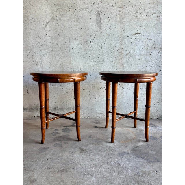 This refined pair of side tables by Henredon embodies the elegance and discipline of Hollywood Regency design, where...