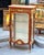 Showcase your most treasured collectibles in this magnificent French Louis XV Curio Display Cabinet, a luxurious statement...