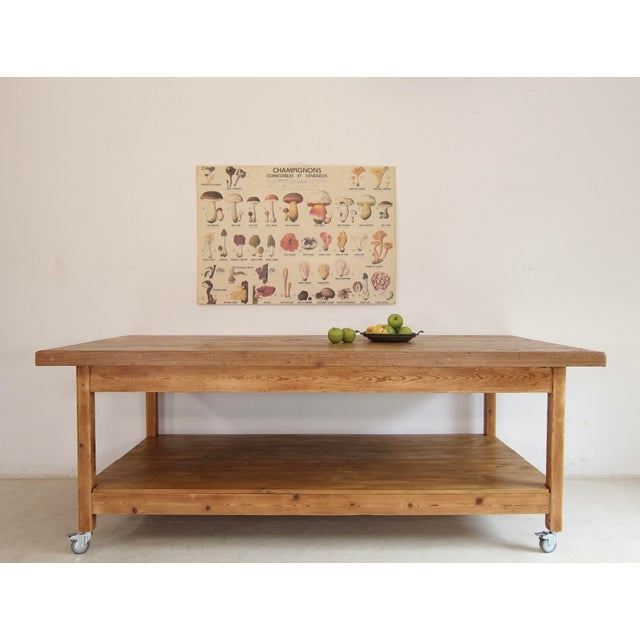 Large vintage workbench or work table on castors. Early to mid-20th century. Crafted from solid pine. Good refurbished...