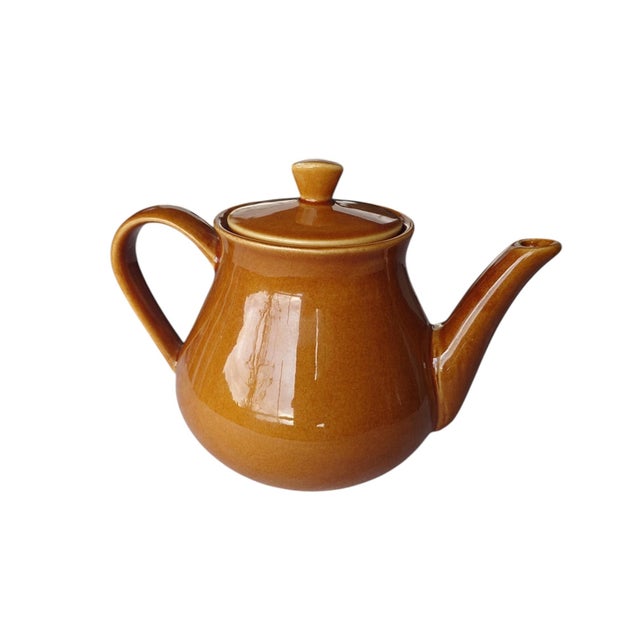 This mid-century teapot from the German ceramics brand Waku likely dates from the 1960s or 1970s and combines functional...